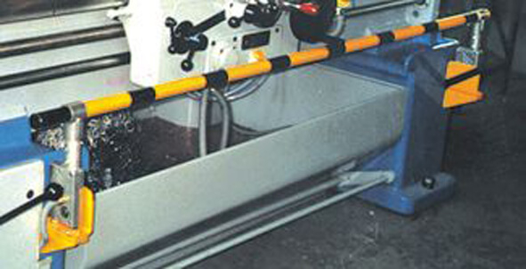 Protecteur de la vis mère et de la barre chariotage